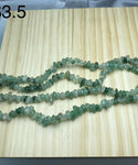 green strawberry chips string