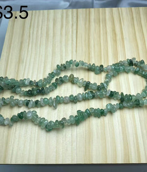 green strawberry chips string